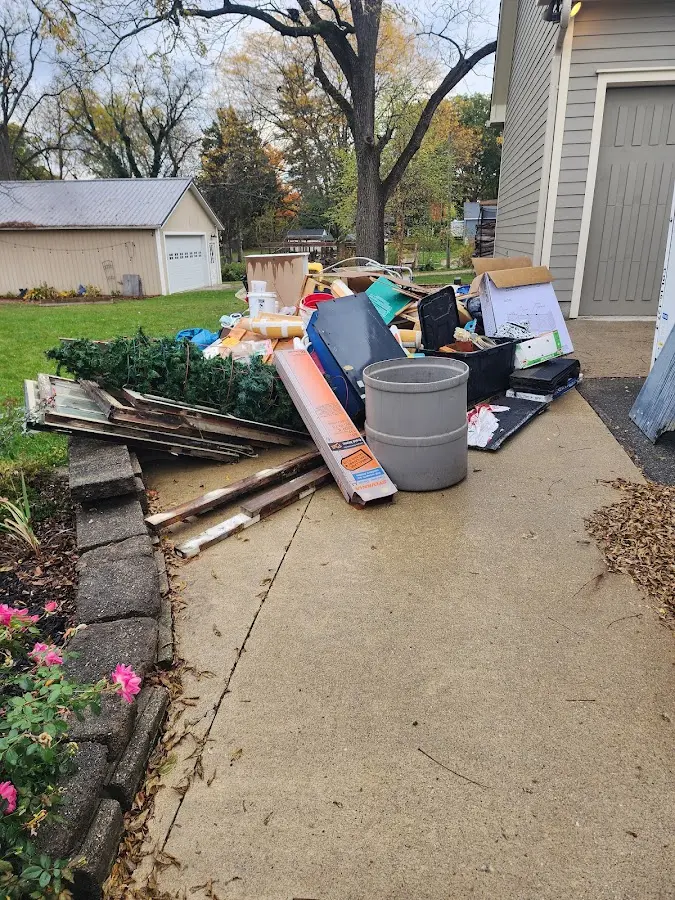 Dumpster being loaded with debris for 30 Yard Dumpster Rental in Upper Pittsgrove